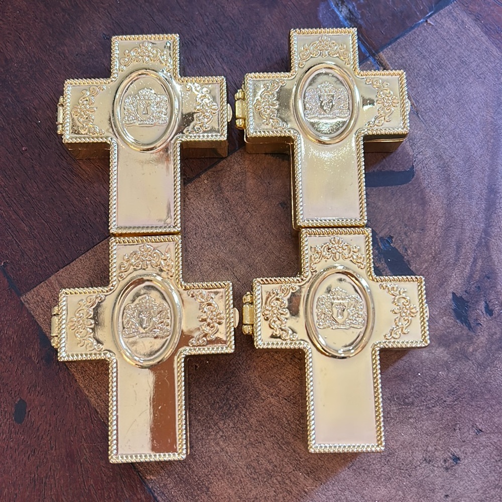4 gold cross gift boxes